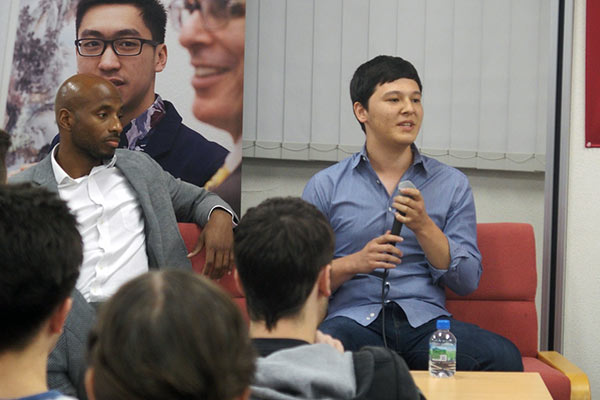 Photo: alumnus discussing life after TUJ in panel discussion one