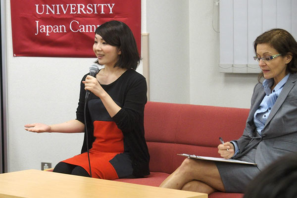 Photo: alumna giving advice on job hunting in panel discussion one