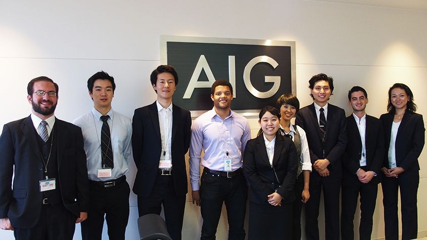 Photo: TUJ alumnus and AIG IT specialist James Pleasant (center), AIG Campus Recruitment Manager Kaoru Itono (right), and TUJ students