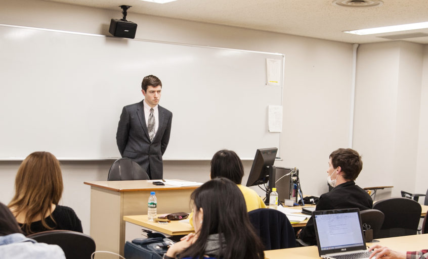 Photo of James Brown teaching in a class.