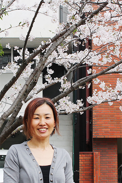 May Watabe under a sakura tree