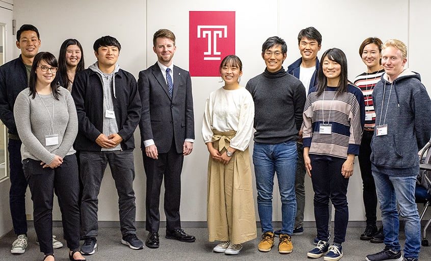 Group photo of students and teacher