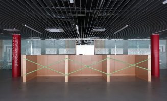 TUJ cafeteria where tables and chairs have been removed for disinfection (Photography by George Miller)