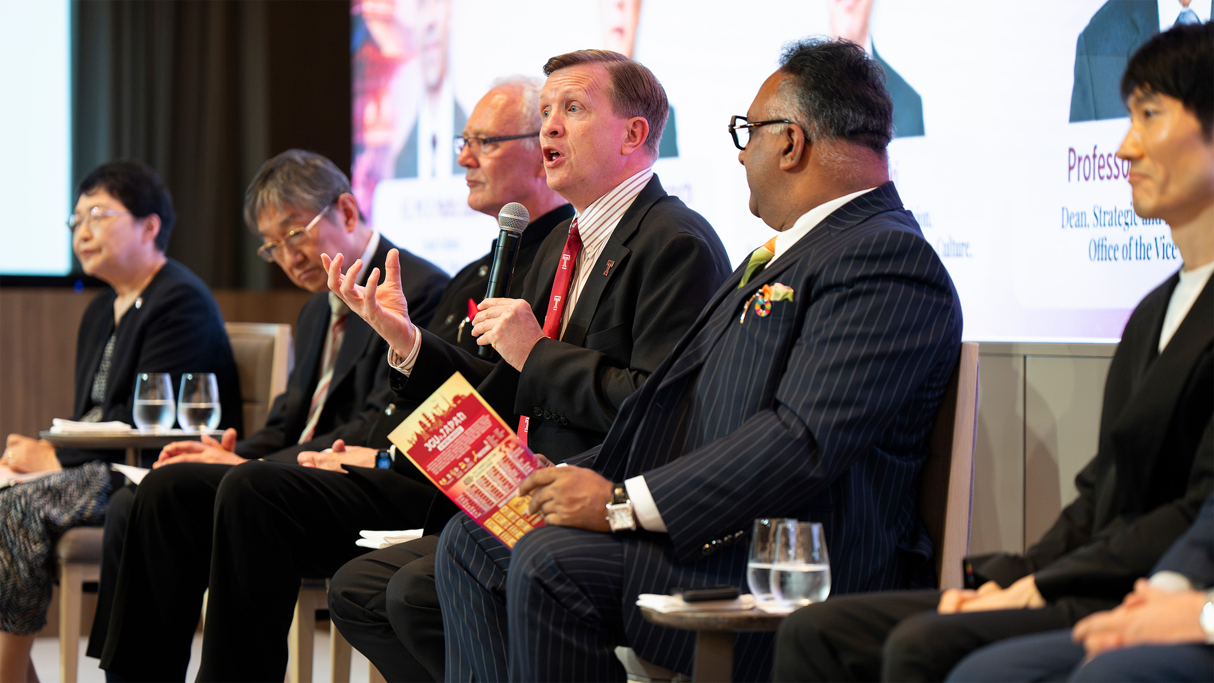 TUJ President and Dean Matthew Wilson speaking during a panel discussion involving top university leaders at the India-Japan Higher Education Forum in Tokyo.